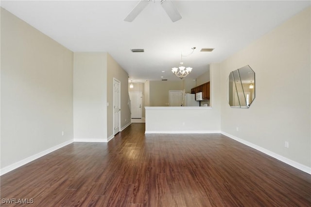 8310 Village Edge Cir Unit 3, Fort Myers, FL 33919 - unfurnished living room featuring visible vents, dark wood-style flooring, ceiling fan with notable chandelier, and baseboards