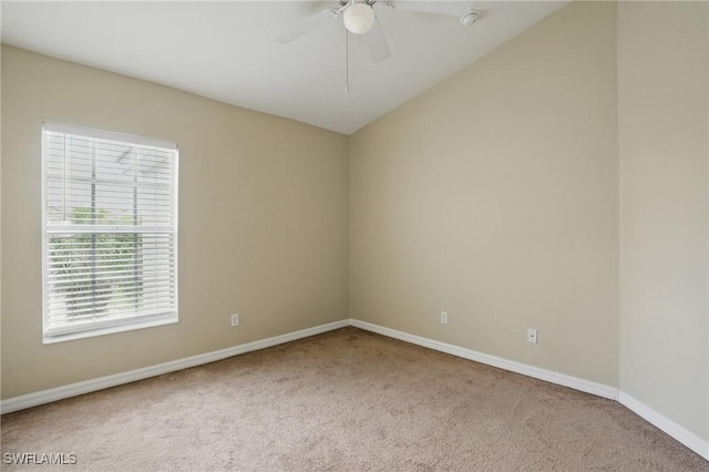 8310 Village Edge Cir Unit 3, Fort Myers, FL 33919 - carpeted empty room with vaulted ceiling, baseboards, and a ceiling fan