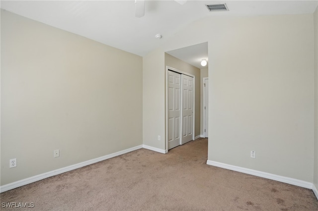 8310 Village Edge Cir Unit 3, Fort Myers, FL 33919 - carpeted empty room with ceiling fan, visible vents, baseboards, and lofted ceiling
