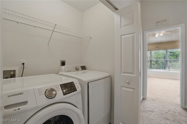 8310 Village Edge Cir Unit 3, Fort Myers, FL 33919 - laundry room featuring ceiling fan, laundry area, independent washer and dryer, visible vents, and carpet flooring