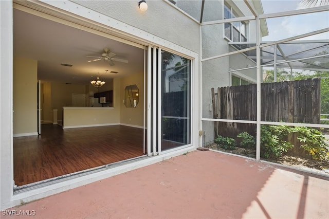8310 Village Edge Cir Unit 3, Fort Myers, FL 33919 - unfurnished sunroom featuring a ceiling fan
