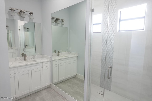224 Preston St, Lehigh Acres, FL 33974 - full bathroom with a shower stall and two vanities