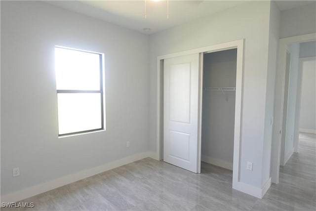 224 Preston St, Lehigh Acres, FL 33974 - unfurnished bedroom with a closet and baseboards
