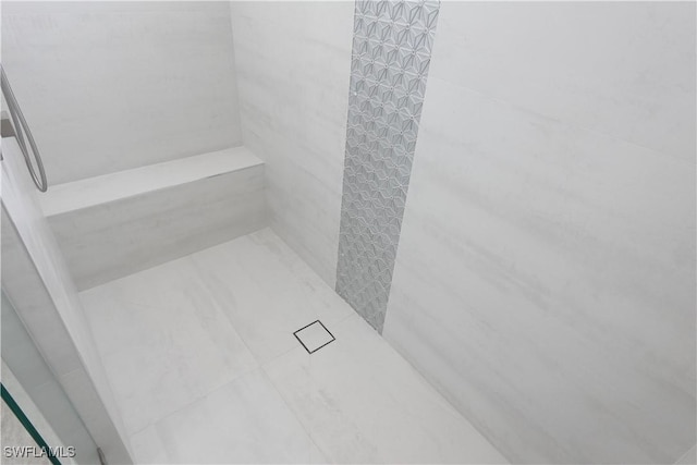 224 Preston St, Lehigh Acres, FL 33974 - full bathroom with a tile shower and marble finish flooring