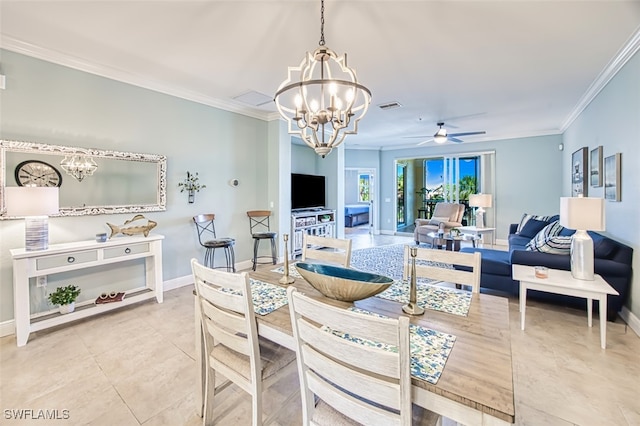 tiled dining area with visible vents, ornamental molding, baseboards, and ceiling fan with notable chandelier