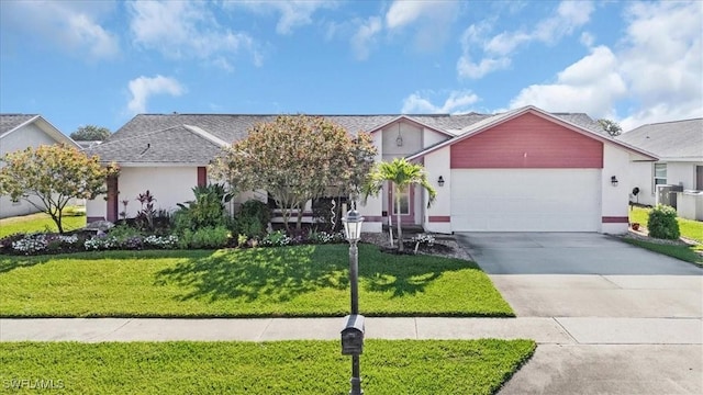 view of front facade with an attached garage, stucco siding, driveway, and a front yard