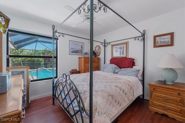 bedroom featuring baseboards, ceiling fan, and wood finished floors