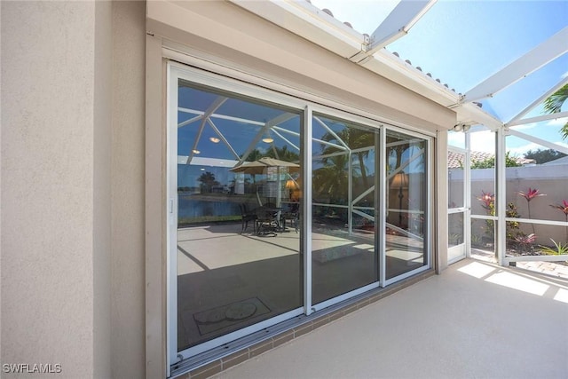 exterior space featuring a sunroom
