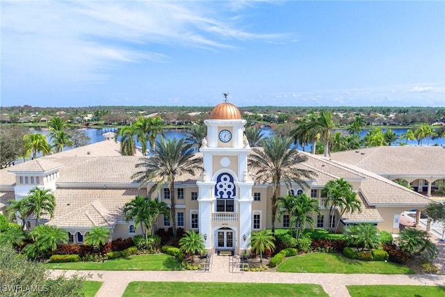 view of building exterior with a water view