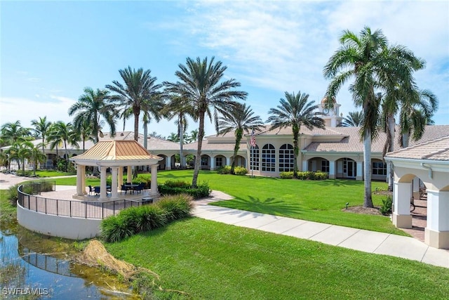 surrounding community featuring a gazebo and a yard