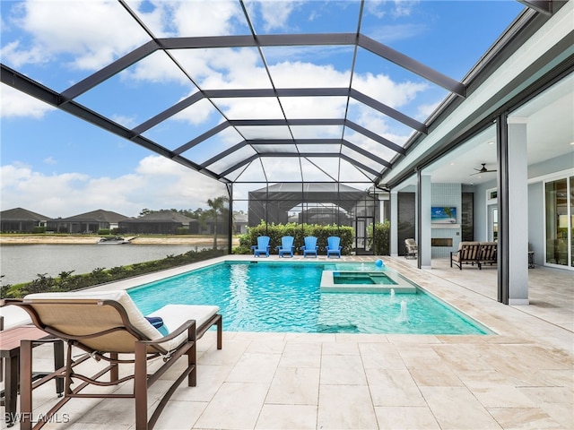 14243 Galley Ct, Naples, FL 34114 - view of pool with a water view, ceiling fan, a pool with connected hot tub, glass enclosure, and a patio