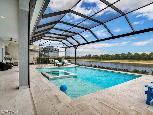 14243 Galley Ct, Naples, FL 34114 - view of pool with a pool with connected hot tub, outdoor lounge area, a water view, a patio area, and glass enclosure