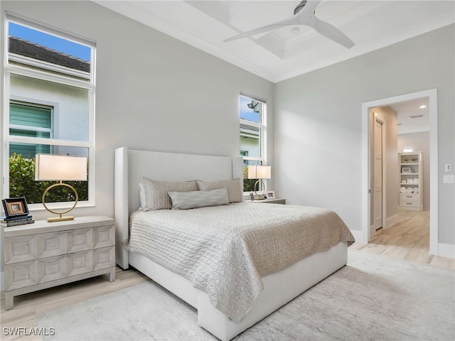 14243 Galley Ct, Naples, FL 34114 - bedroom featuring a ceiling fan and wood finished floors