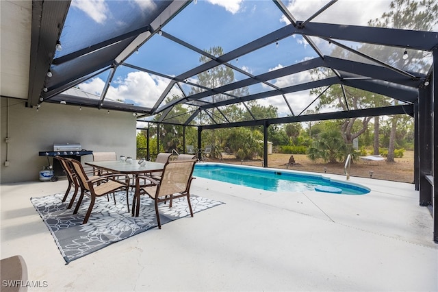 swimming pool featuring a patio area and outdoor dining space