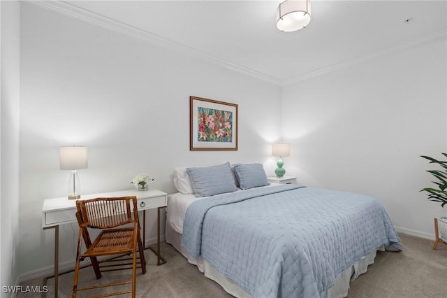 bedroom featuring baseboards, carpet flooring, and ornamental molding
