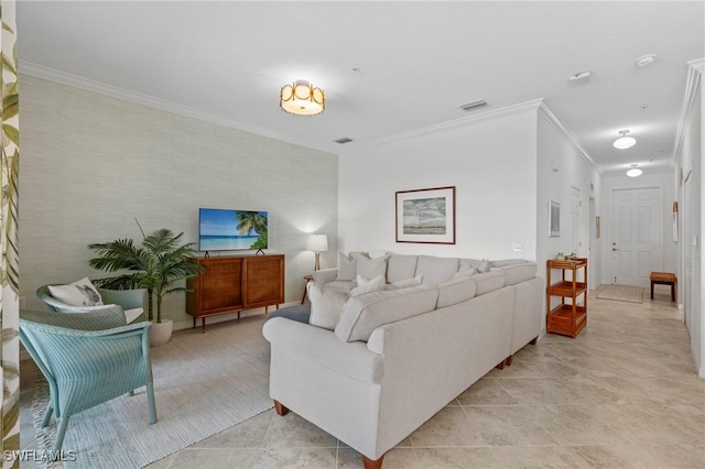 living area with visible vents, crown molding, and light tile patterned floors
