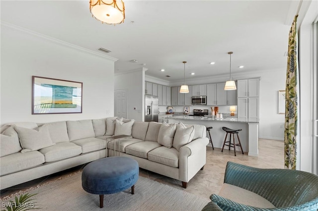 living area featuring crown molding, recessed lighting, and visible vents
