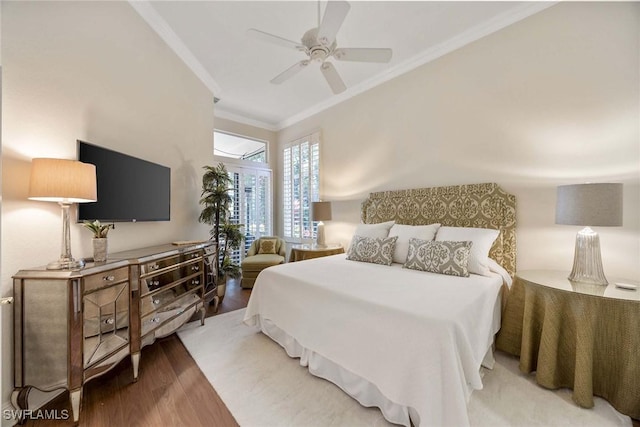 bedroom with crown molding, ceiling fan, and wood finished floors