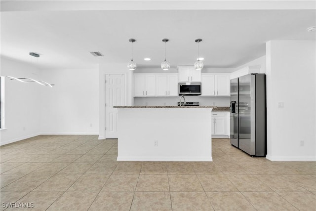 kitchen with light tile patterned floors, baseboards, visible vents, white cabinetry, and appliances with stainless steel finishes