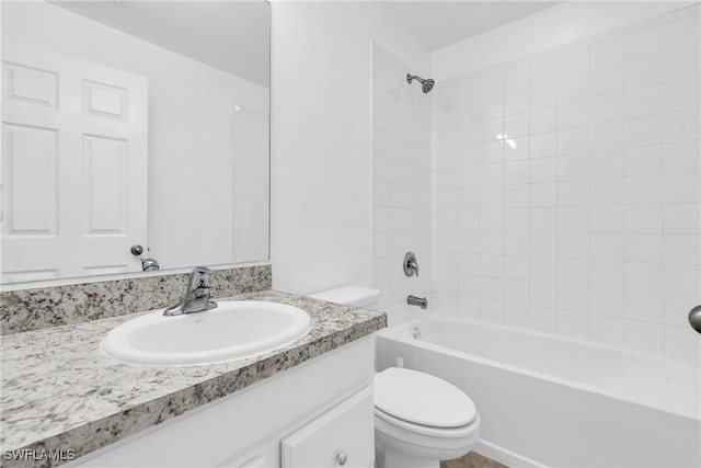 full bath with toilet, vanity, and shower / tub combination