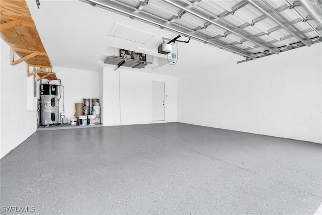 garage with water heater and a garage door opener
