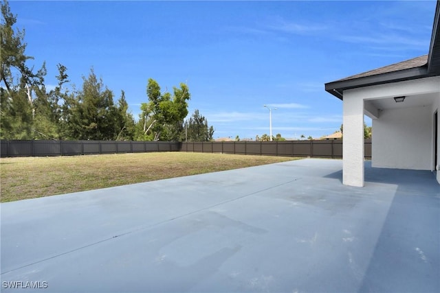 view of patio with a fenced backyard