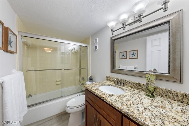 260 Seaview Ct Unit 402, Marco Island, FL 34145 - full bath featuring toilet, visible vents, bath / shower combo with glass door, and vanity