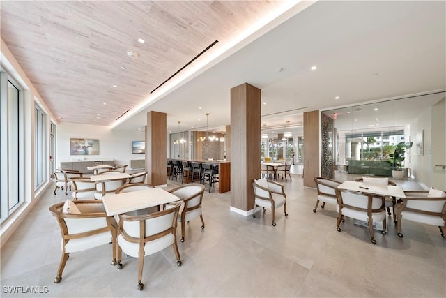 260 Seaview Ct Unit 402, Marco Island, FL 34145 - dining area with recessed lighting, baseboards, and wooden ceiling