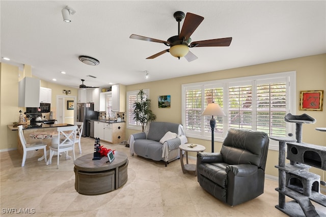4748 San Carlo Ct, Naples, FL 34109 - living room with ceiling fan, baseboards, and recessed lighting