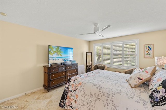 4748 San Carlo Ct, Naples, FL 34109 - bedroom featuring baseboards and ceiling fan