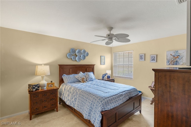 4748 San Carlo Ct, Naples, FL 34109 - bedroom featuring baseboards, ceiling fan, and light colored carpet