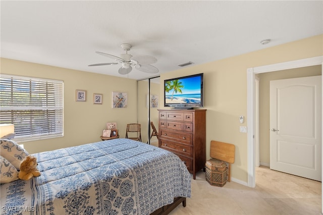 4748 San Carlo Ct, Naples, FL 34109 - bedroom featuring baseboards, ceiling fan, a closet, and visible vents