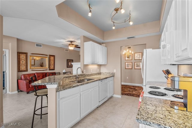11016 Mill Creek Way Unit 2403, Fort Myers, FL 33913 - kitchen featuring white appliances, a sink, white cabinetry, and light tile patterned floors