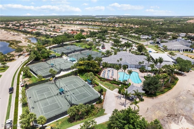 11016 Mill Creek Way Unit 2403, Fort Myers, FL 33913 - aerial view of property's location featuring a pool area, a large body of water, and nearby suburban area