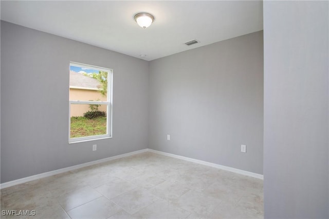 1821 SW 25th St, Cape Coral, FL 33914 - unfurnished room with visible vents and baseboards