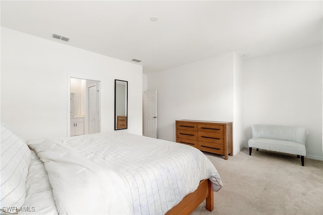 bedroom with carpet and visible vents
