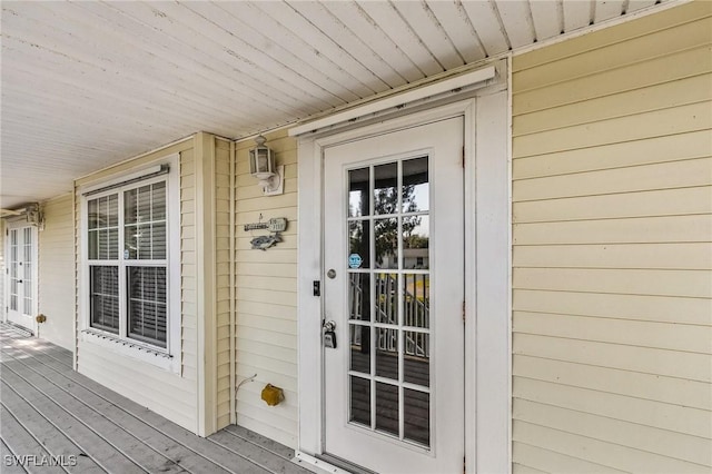 entrance to property with a porch