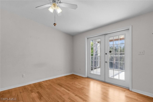doorway to outside featuring french doors, light wood-style flooring, baseboards, and a ceiling fan