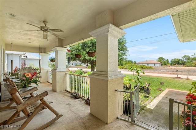 balcony featuring ceiling fan and covered porch