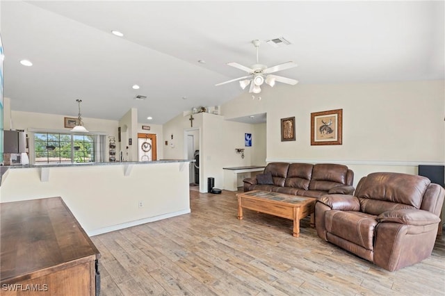 3303 32nd St SW, Lehigh Acres, FL 33976 - living area featuring a ceiling fan, lofted ceiling, light wood-style floors, and recessed lighting