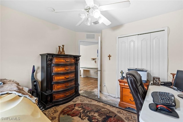 office area featuring ceiling fan and visible vents