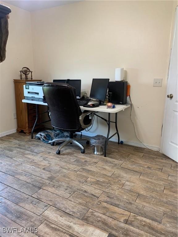 3303 32nd St SW, Lehigh Acres, FL 33976 - office area featuring hardwood / wood-style floors