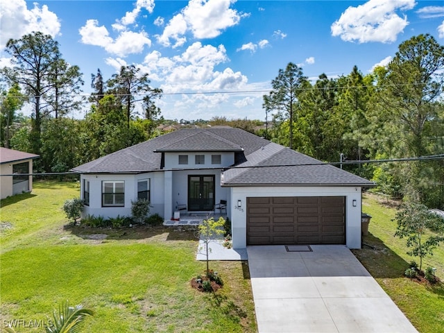 prairie-style house with driveway, french doors, a shingled roof, and stucco siding