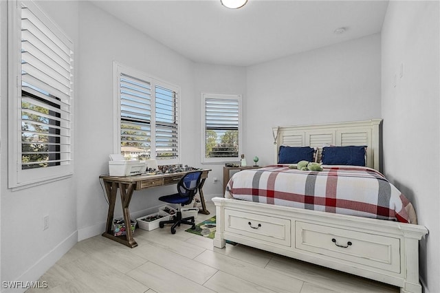 bedroom with baseboards
