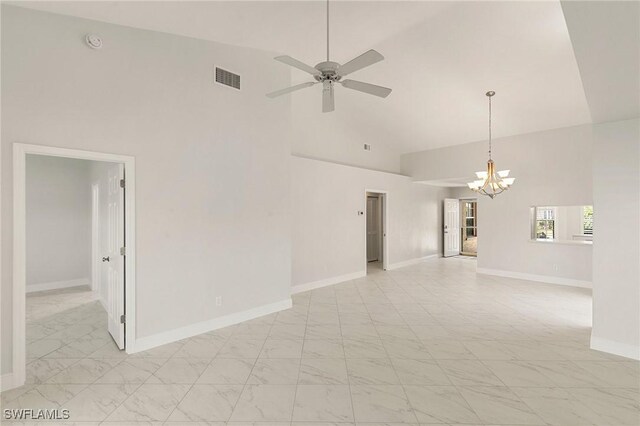 2524 Sailors Way Unit 118, Naples, FL 34109 - unfurnished room with visible vents, high vaulted ceiling, baseboards, ceiling fan with notable chandelier, and marble finish floor