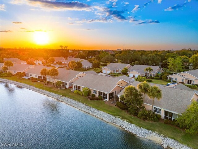 2524 Sailors Way Unit 118, Naples, FL 34109 - bird's eye view featuring a water view and a residential view