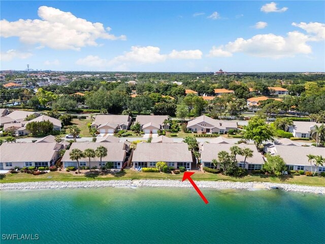 2524 Sailors Way Unit 118, Naples, FL 34109 - birds eye view of property featuring a water view and a residential view