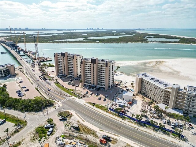 bird's eye view featuring a water view and a view of city
