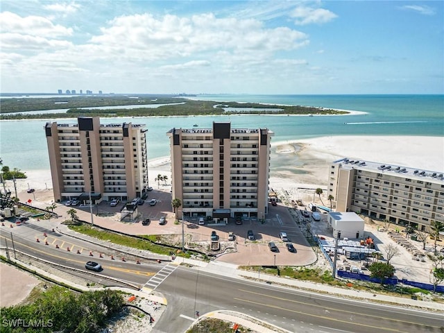 drone / aerial view with a water view