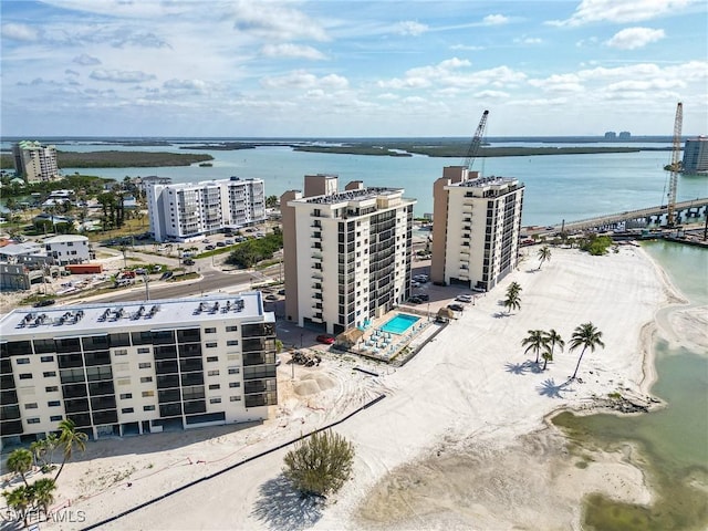 bird's eye view featuring a water view and a view of city